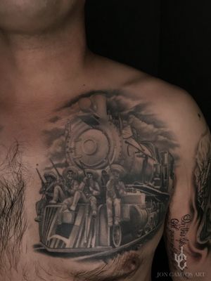 Healed mexican revolution train chest piece done by Jon Campos art. Dallas, Tx. 