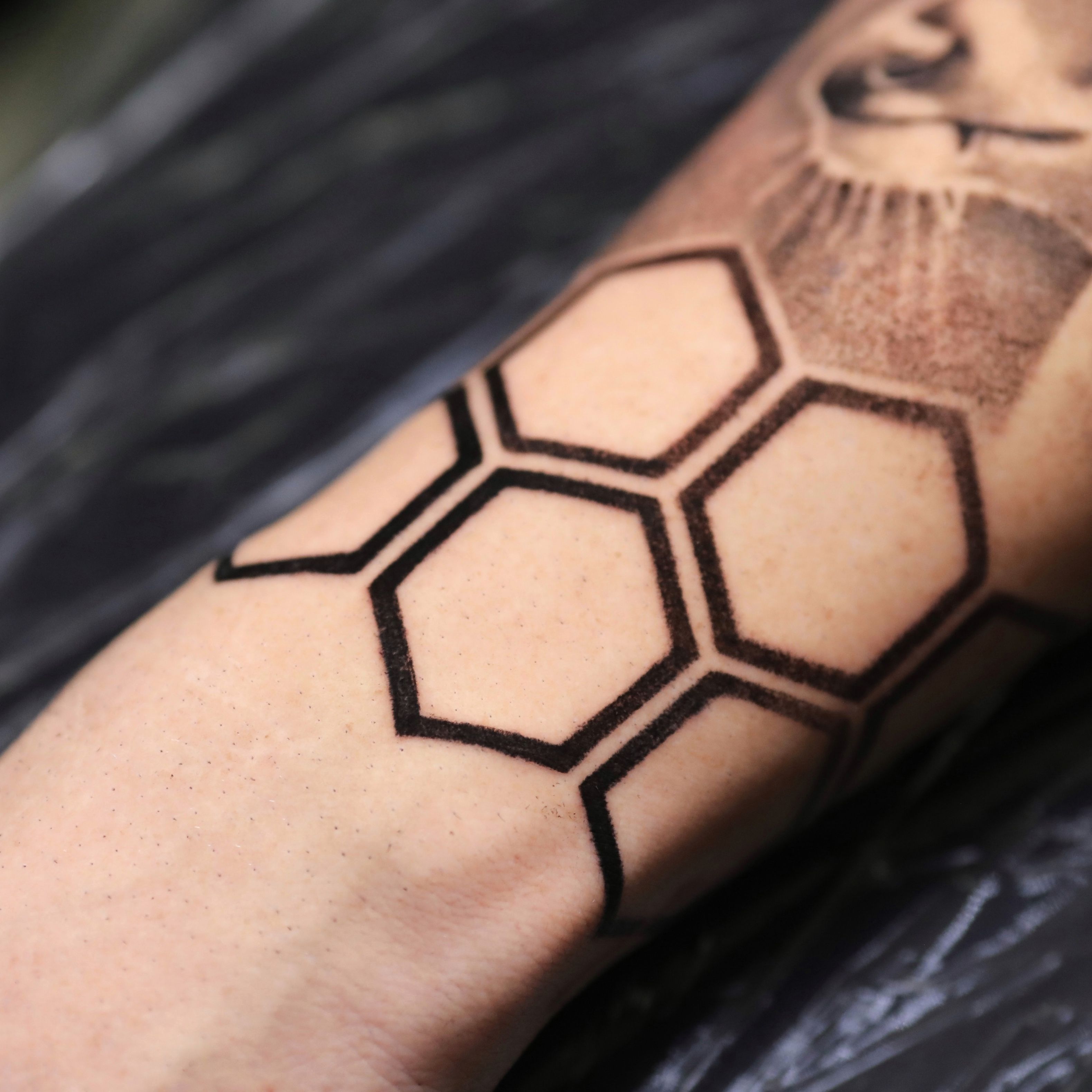 Bees and honeycomb filler in a slice of space between existing tattoos   Instagram