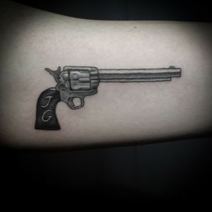 James Gang pistol, part of matching family tattoos
