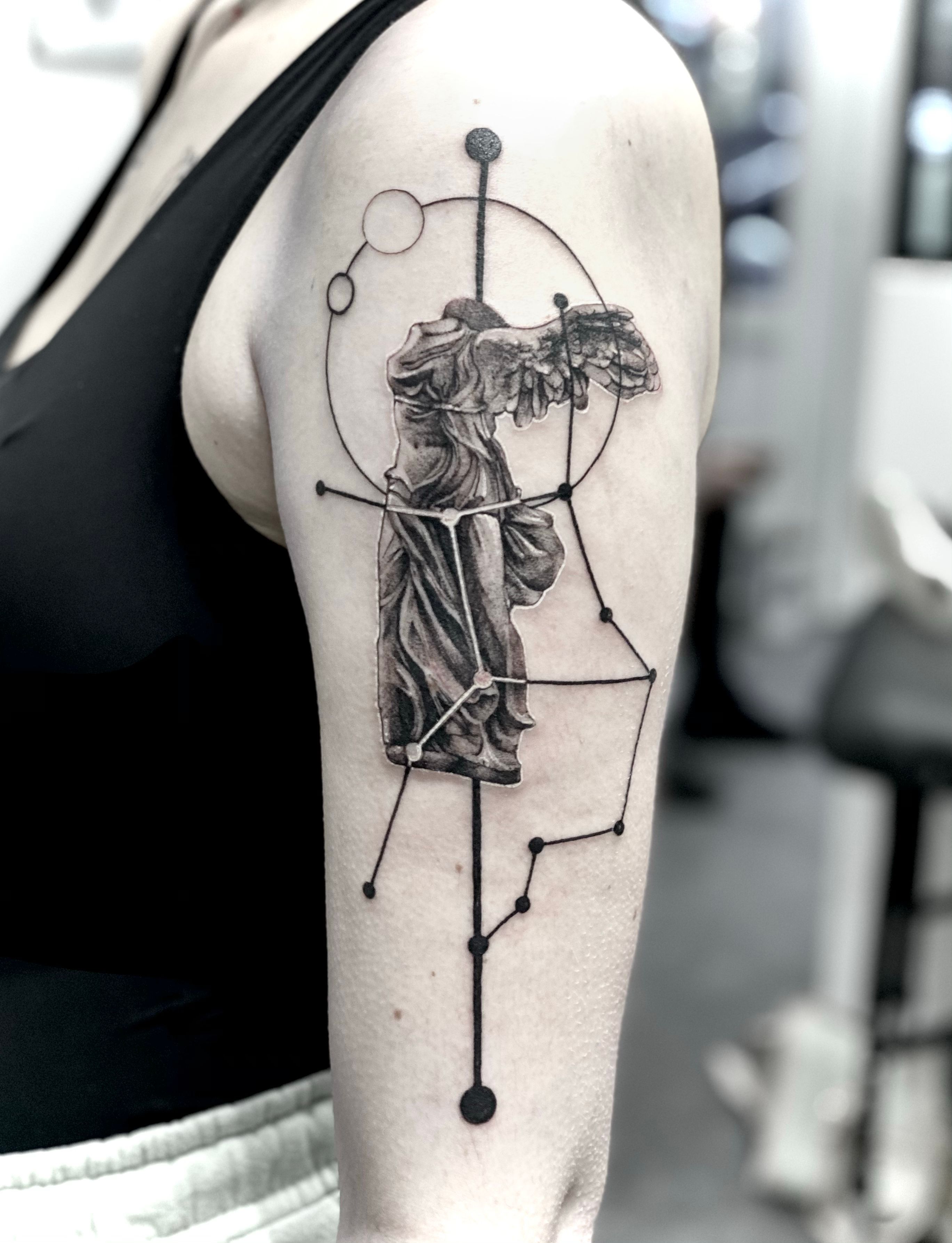 Oscar Akermo on Instagram Franciscos arm decorated with the Nike of  Samothrace and hidden messages in the geometry  Greek tattoos Nike  tattoo Hermes tattoo