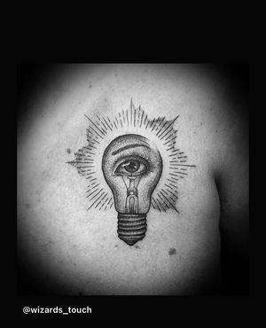 Experience the mysterious allure of a blackwork lamp and eye tattoo on your chest in Miami. Unique and captivating design.