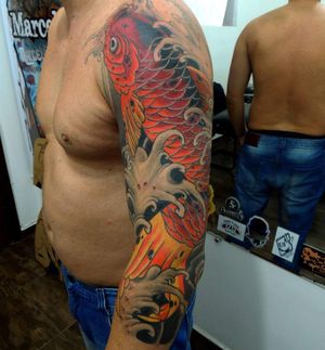 Marcel Oliveira's stunning sleeve design featuring intricate koi fish, waves, and fingerwaves in traditional Japanese style.