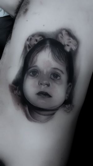 Elegant black-and-gray illustration of a girl on ribs, expertly done by Marcel Oliveira. Bring your tattoo vision to life with this stunning piece.