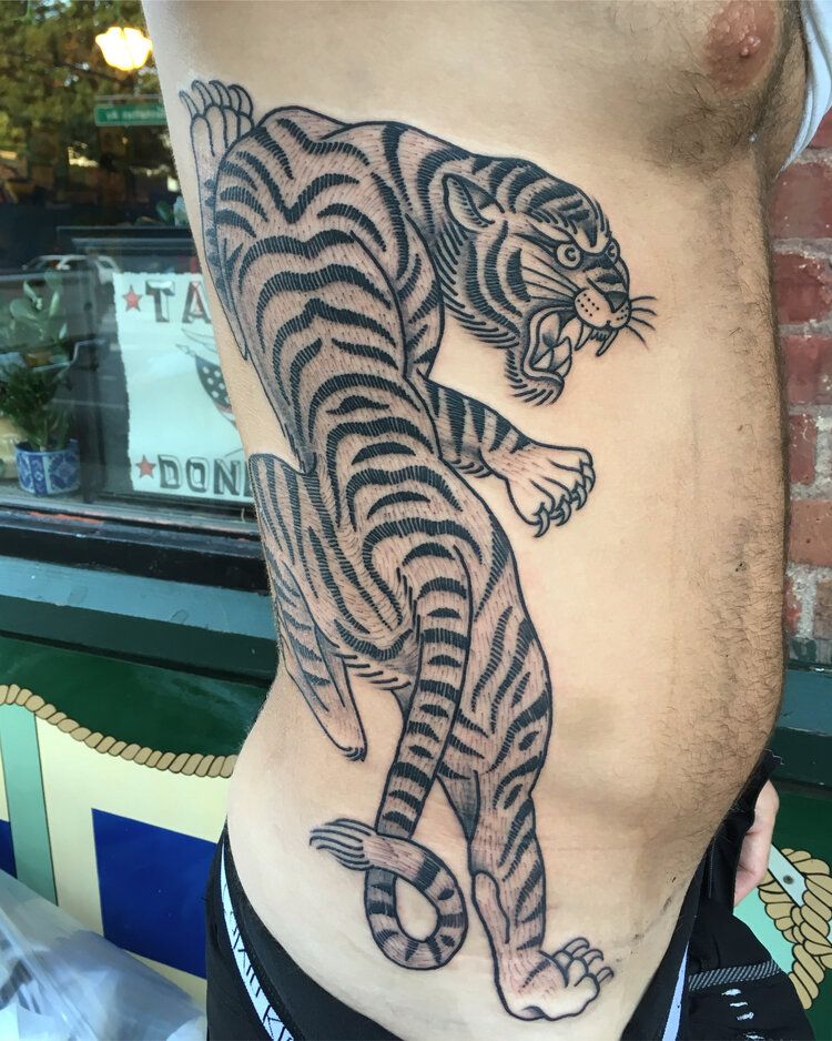 Half geometric tiger tattoo by OK | Tatuaje de tigre, Diseño del tatuaje  del tigre, Tatuaje de tigres