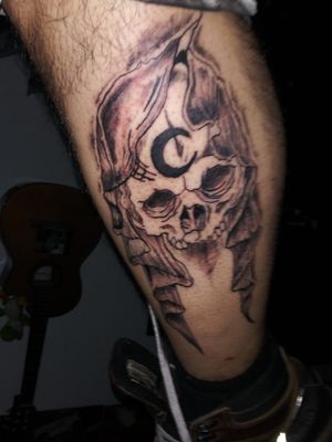 first tattoo I ever did. on my own leg lol. 