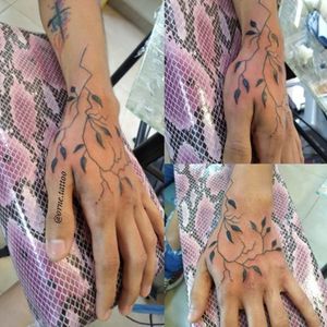 Freehand hand tree tattoo