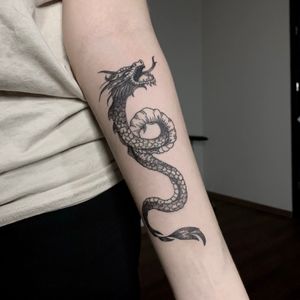 Custom dragon tattoo