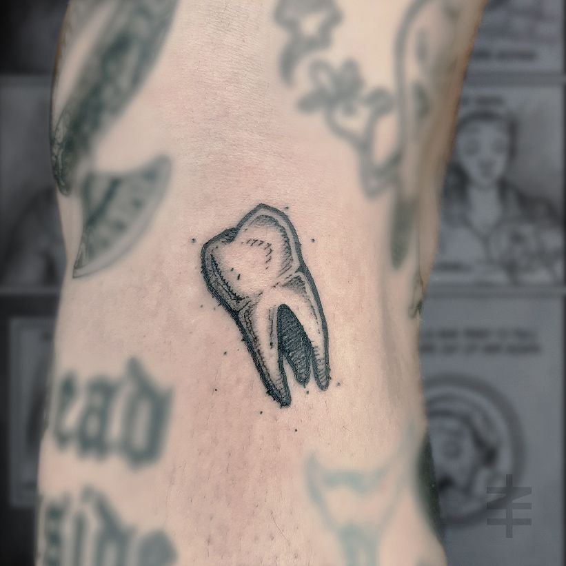 The Meaning Behind Tooth Tattoo  TattoosWin