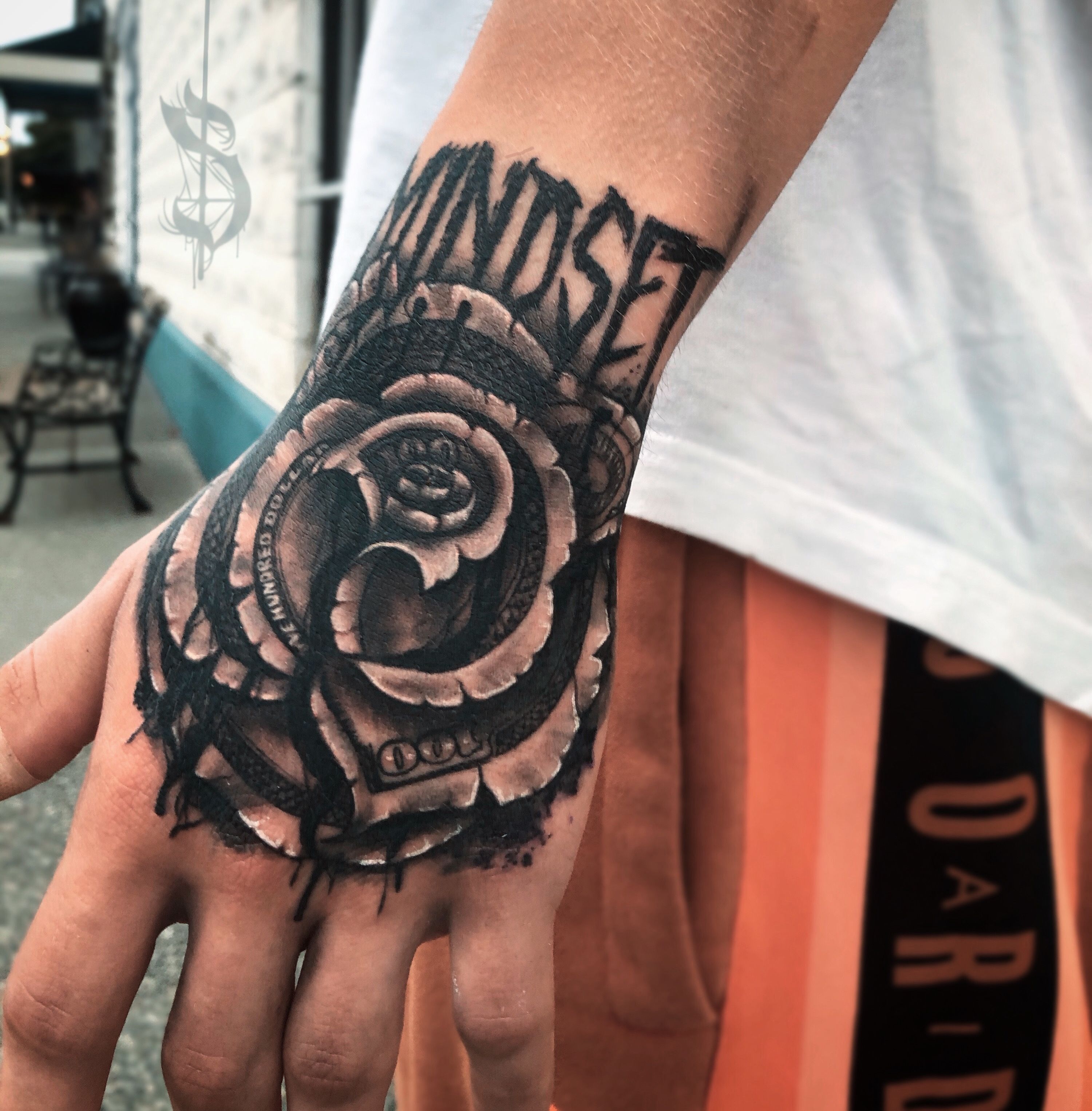 Dollar rose on hand  Donatas Lasys tattoo artist  Facebook