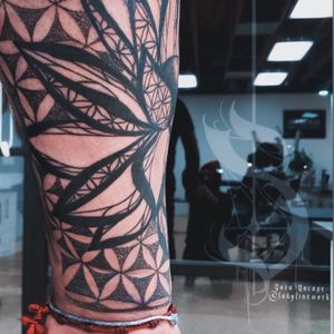 Lotus and flower of life tattooing 