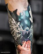 Realistic colorful tattoo of a dove by tattoo artist Alexei Mikhailov @mikhailovtattoo