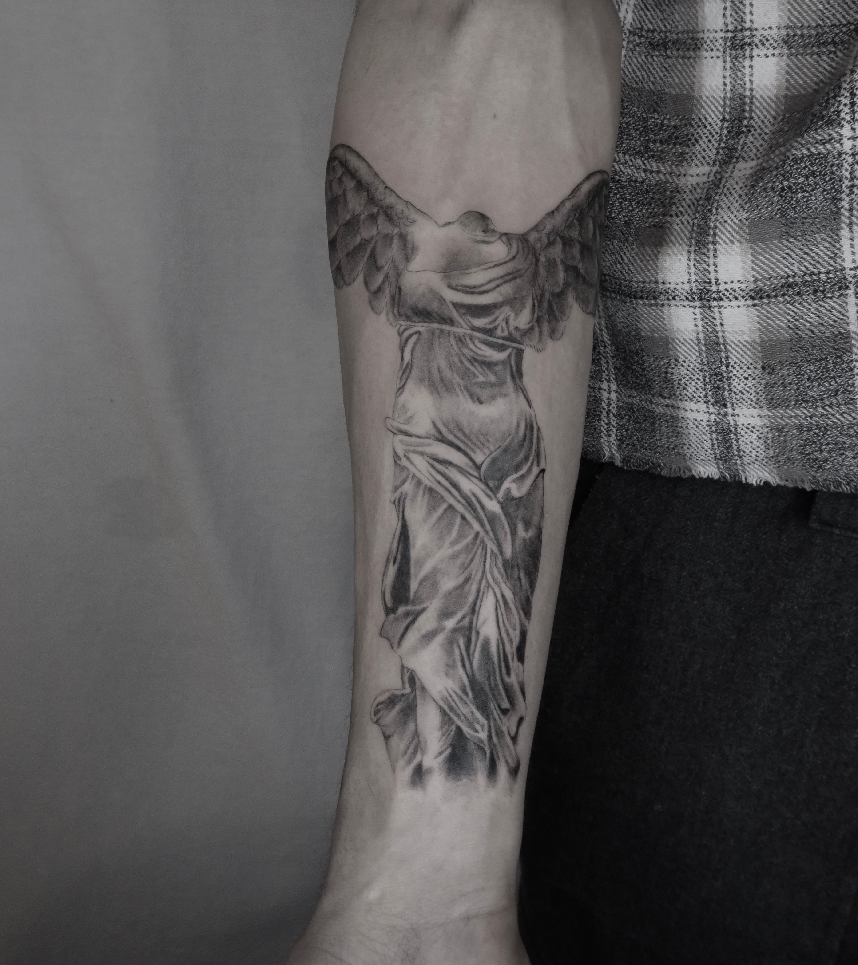 Winged Victory of Samothrace tattoo on the inner forearm  Nike tattoo  Tattoos Blackwork tattoo