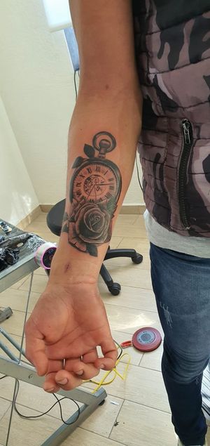 pocket watch and rose