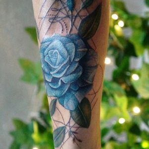 Realistic coloured rose flower with geometry tattoo 