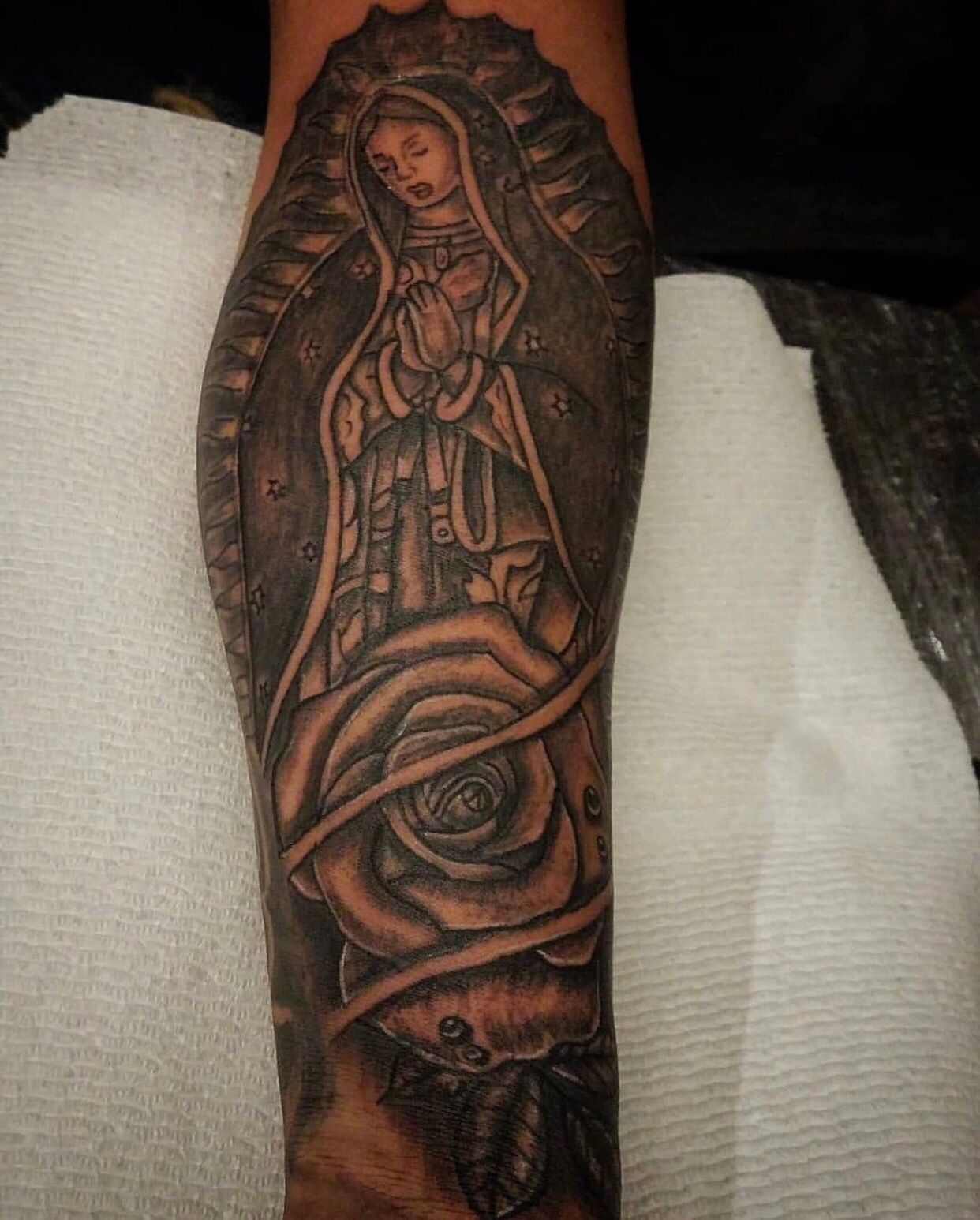 virgin mary forearm tattoo