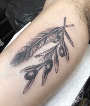 Beautiful black and gray design by Sophie Rose Hunter, combining a delicate feather with vibrant fruit imagery.