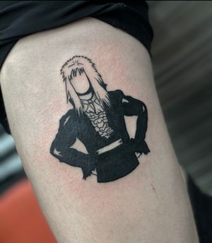Experience stunning blackwork art on your upper arm with this illustrative woman tattoo by the talented Miss Vampira.