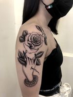 Rose and hand