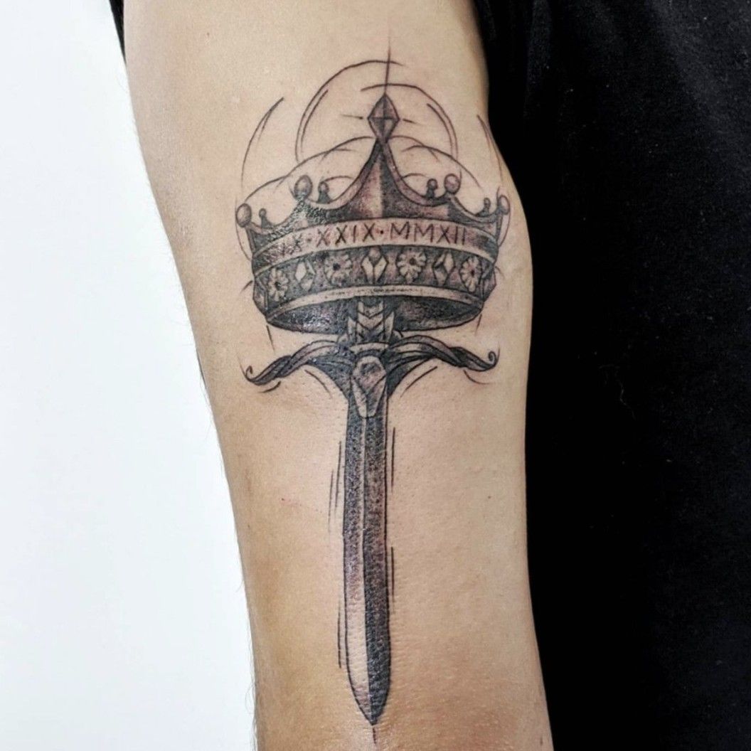 Tattoo uploaded by Ricardo Mesa • Crown sword roman numerals • Tattoodo