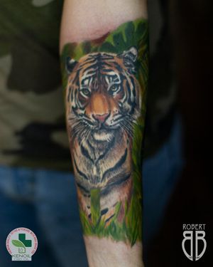 Tiger in jungle, part of sleeve