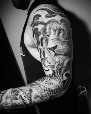 Black and grey Realistic lion & angel statue full sleeve tattoo