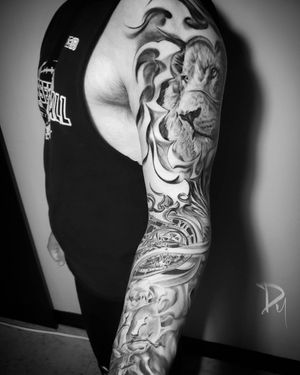 lion & clock full sleeve realism tattoo by Dylan C, Tattoo artist in Montreal