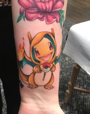 Charmander dressed as Charzard 