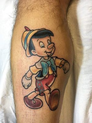 Pinocchio cartoon tattoo