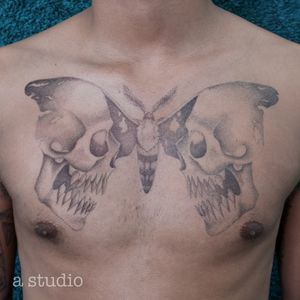 Moth skull dotwork tattoo 