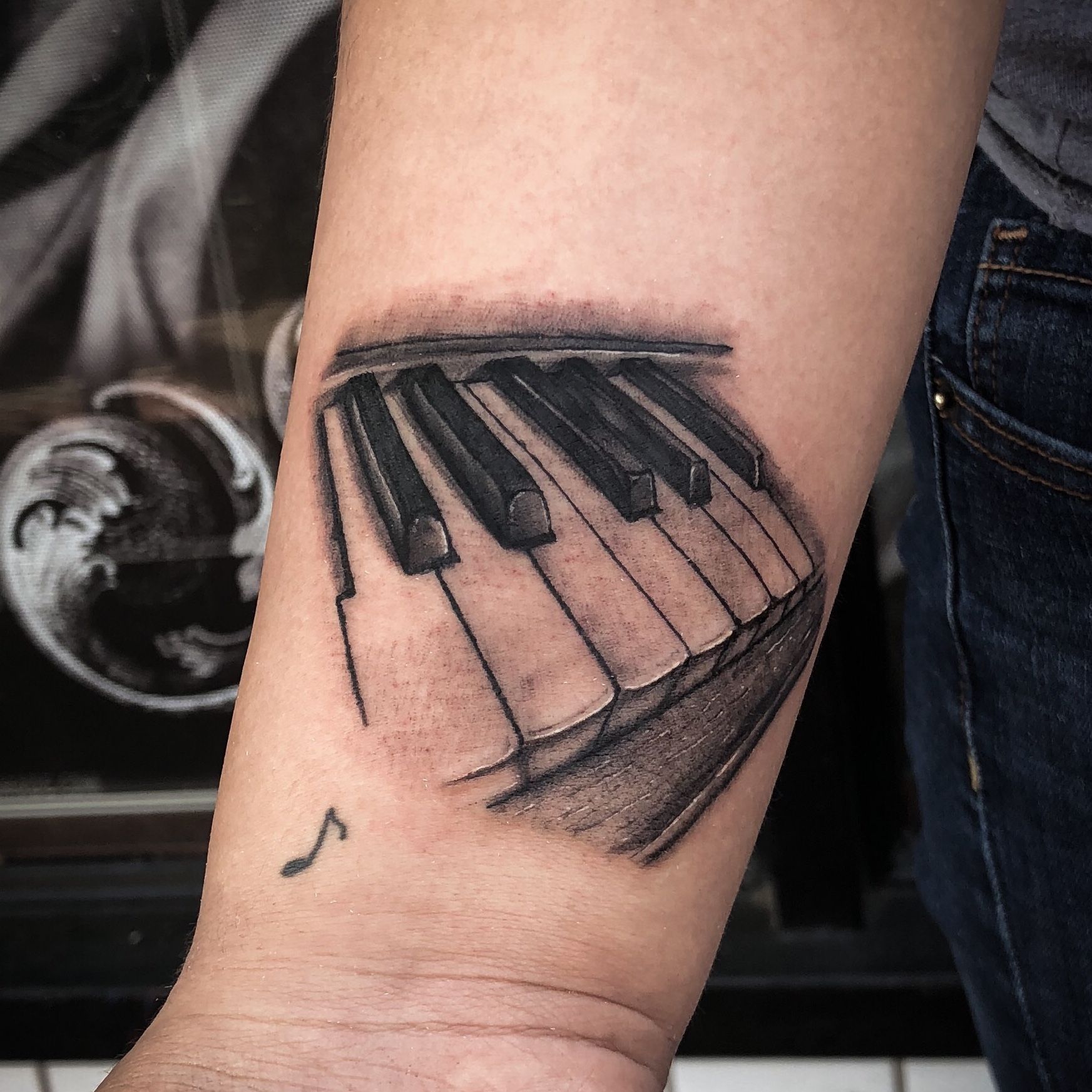 Minimalist Piano Tattoo on Arm | Discreet tattoos, Piano tattoo, Music  tattoo designs