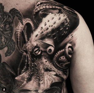 Octopus cover-up tattoo created by Luis Puedmag at Puedmag Inkpire Tattoo Shop, Toronto CA