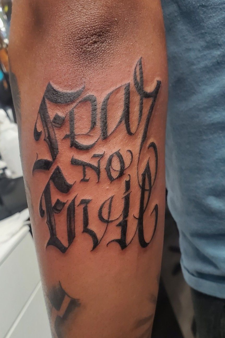 Tattoo uploaded by Norman Demorte • Fear No Evil. Custom script. • Tattoodo