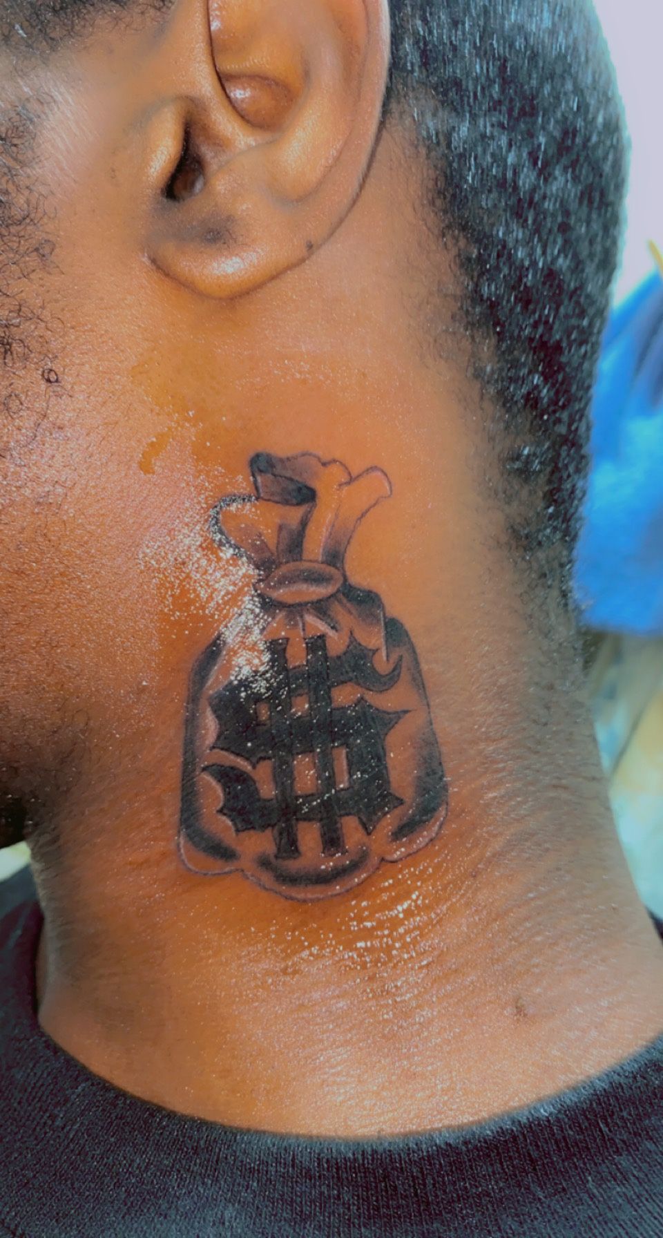 Pin by Aman inkplay tattoo studio on money bag | Neck tattoos women, Money  bag tattoo, Tattoos for black skin
