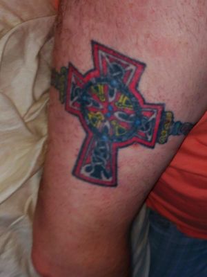 Celtic Knot Cross 2004 Ankeny Iowa. Band goes all the way around inside arm. 