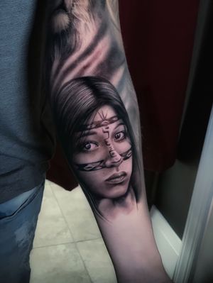 Capture the beauty of native culture with this stunning black and gray realism tattoo of a woman, expertly done by Marcel Oliveira.