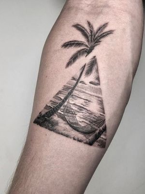 Beach themed tattoo.