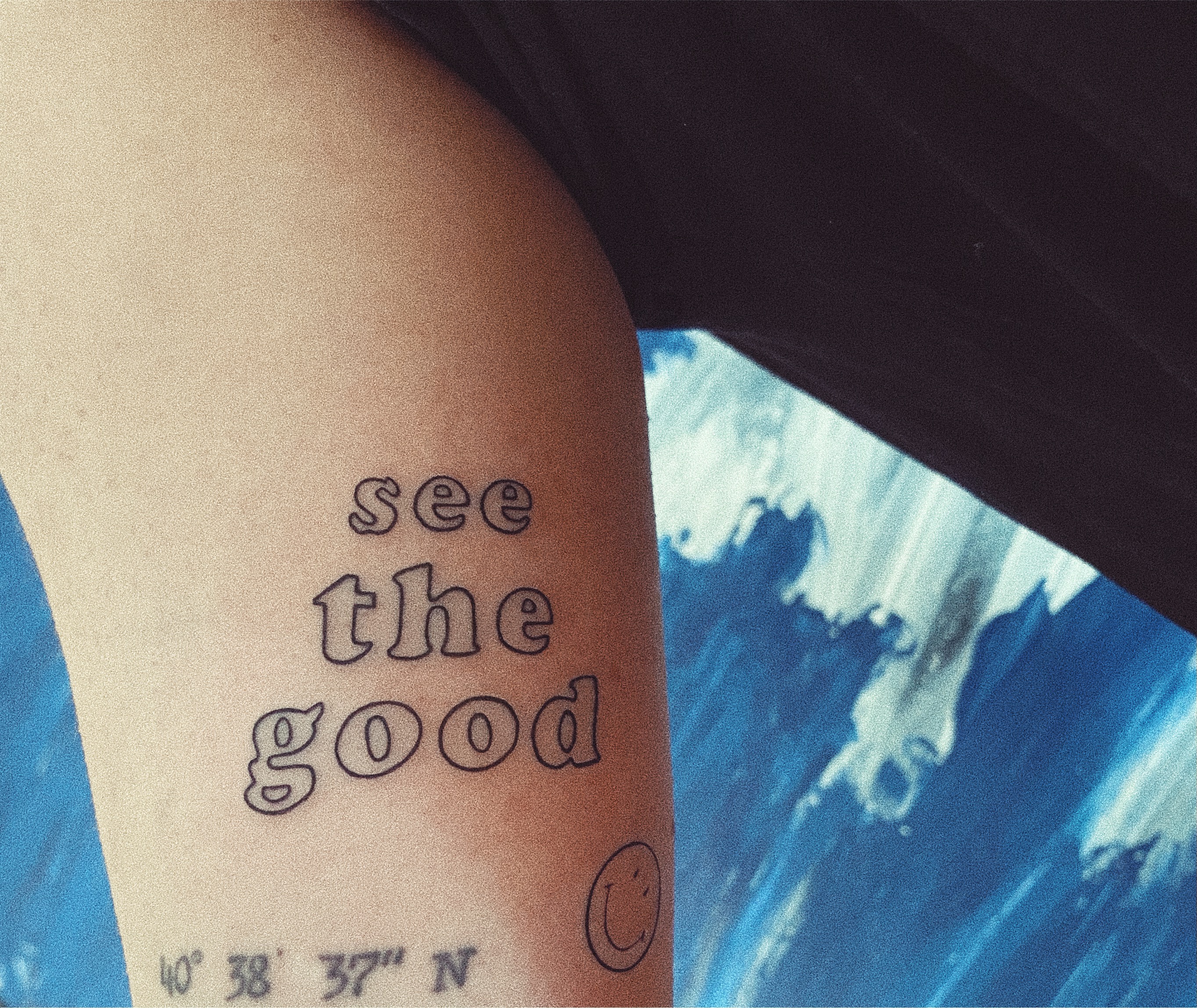 See the good lettering tattoo located on the upper