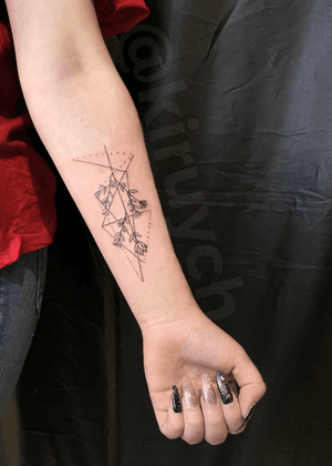 Linework geometric forearm tattoo