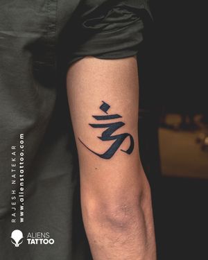 Checkout this amazing OM tattoo by Rajesh Natekar at Aliens Tattoo India.Visit our website to see more of this tattoos here -www.alienstattoo.com