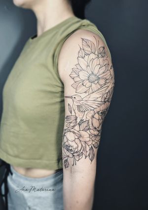 Ana Maturana’s tattoo flowers bird