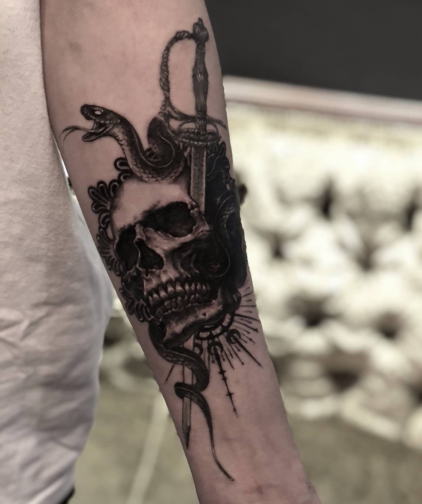 Everything You Need to Know About Getting a Skull and Sword Tattoo  The  Skull  The Skull and Sword