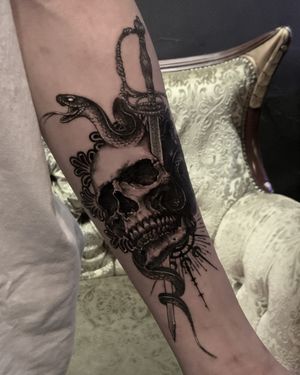 skull and sword tattoo