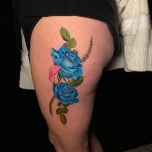 Finished roses and cala lily. This is about 85% a healed tattoo. The bottom leaves are fresh and a few small touch up spots though the bottom rose. Everything else is healed up! 