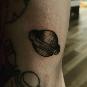 cool planet tattoo!
