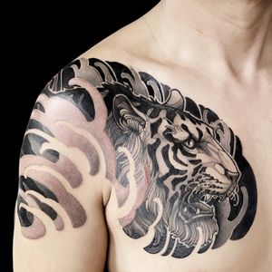 Tiger chest to shoulder piece with Japanese inspired ornamental finger waves.