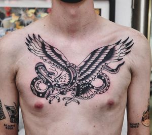 Battle Royale chest piece done by Lachie Grenfell....@lachiegrenfell....#lachiegrenfell #melbournetattoo #melbournetattooist #melbournetattoos #victoriantattoo #eagletattoo #chestpiecetattoo #traditionaltattoo #flashtattoos #picoftheday #tattoooftheday #tattooconnectz #blackworkers #blackworkerssubmission #blackworktattoo #blacktraditionaltattoo #snaketattoo #supportsmallbusiness #supportlocalartists #northmelbournetattoo #vicmarkettattoo #blacktraditionalink