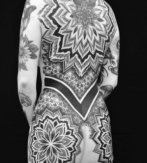 We have been waiting eagerly to see this large back piece completed. Done by Chris Jones, (except small centre mandala) this has been a huge effort by both Chris and customer Ellie.If your interested in starting a new project with Chris you can contact him directly via email at chrisjonestattooer@gmail.com...@chrisjonestattooer...#chrisjonestattoos #chrisjonestattooer #melbournetattooist #melbournetattoos #melbournetattoo #backpiece #backpiecetattoo #blackworkerssubmission #blackworkers #blackworkers_tattoo #geometrictattoos #geometrictattoo #mandalatattoo #mandalatattoos #patternwork #patternworktattoo #patternworkerssub #sacredgeometry #sacredgeometrytattoo #vicmarkettattoo #northmelbournetattoo
