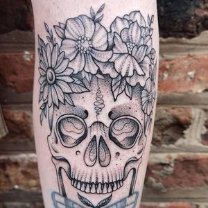 Skull with flower crown added to an existing moth piece (not by me) 