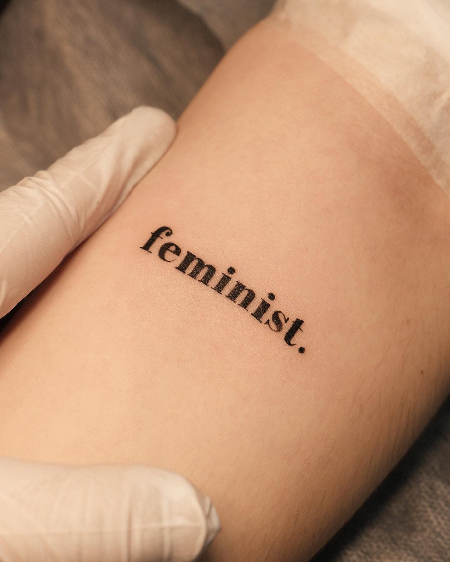 13 inch feminist tattoo on... - Nasty Tattoos & Piercing | Facebook
