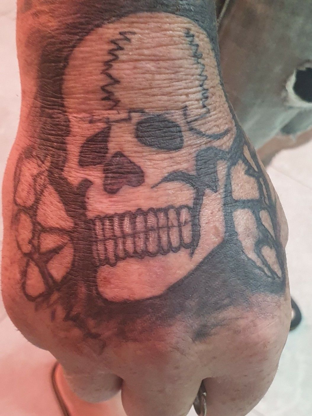 Tattoo uploaded by Wes Newton • Ss Scull hand tattoo • Tattoodo